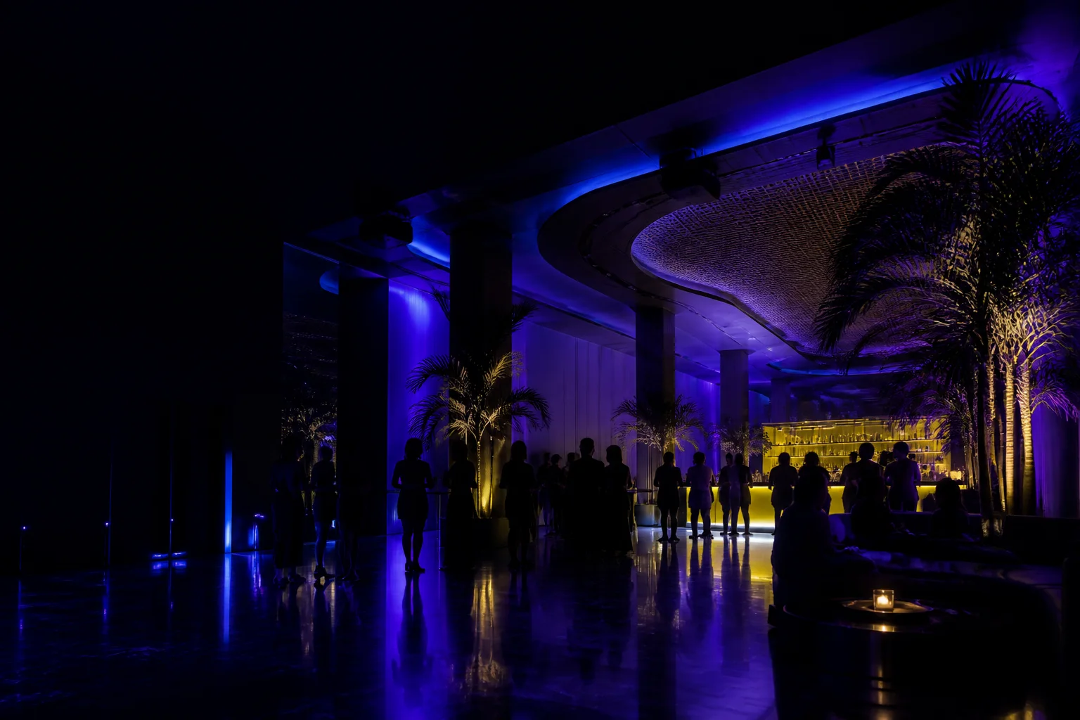 A violet-lit nightlife room in Miami